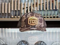 TCO Fly Shop Hat Crest Logo - Printed 5 Panel Trucker Admiral Duck Camo - Black -Simms || Patagonia || Hareline Sales image 2f22518f 2fa1 4315 84b4 2e8349a2ace2